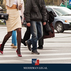 Pedestrians in Cleveland, OH crossing the street in the crosswalk

