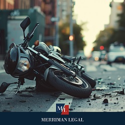 After a Cleveland motorcycle accident, a motorcycle lies on the ground with along with evidence of the crash 